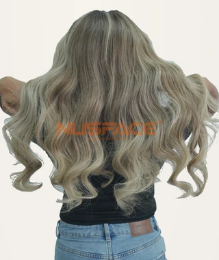 Sage Iris wavy hand-painted balayage wig, back view of beige waves with darker grey-green strands between them