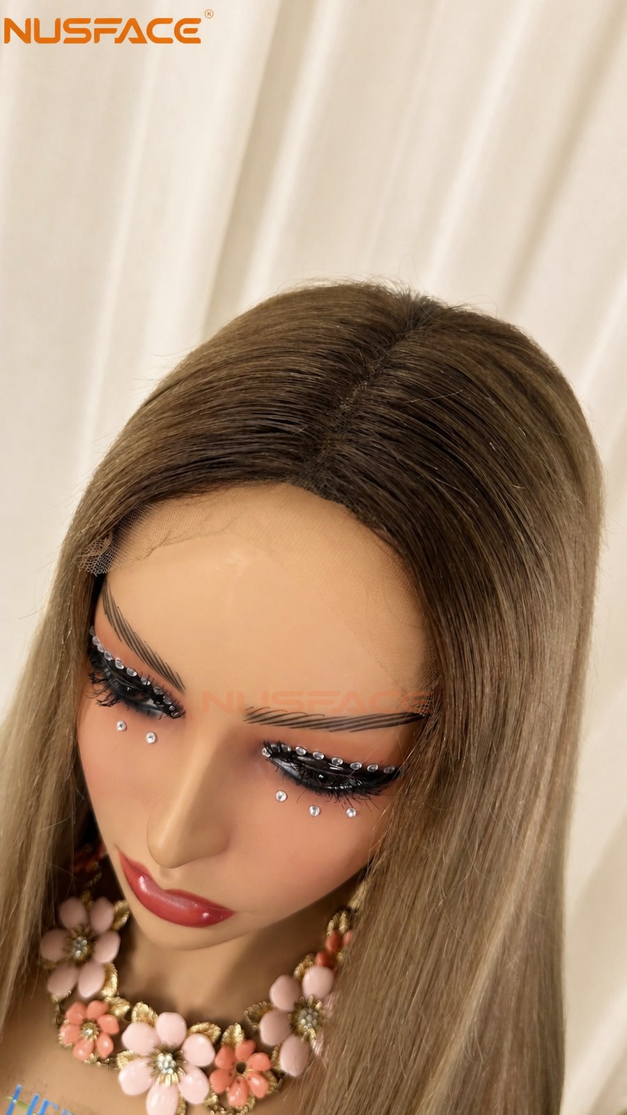 top view of light ash blonde balayage lace front wig