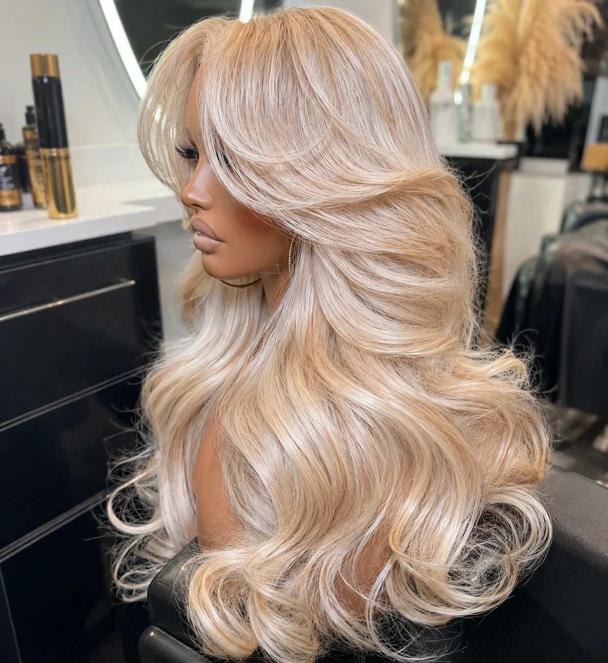 light blonde hand-painted balayage wig styled in a salon