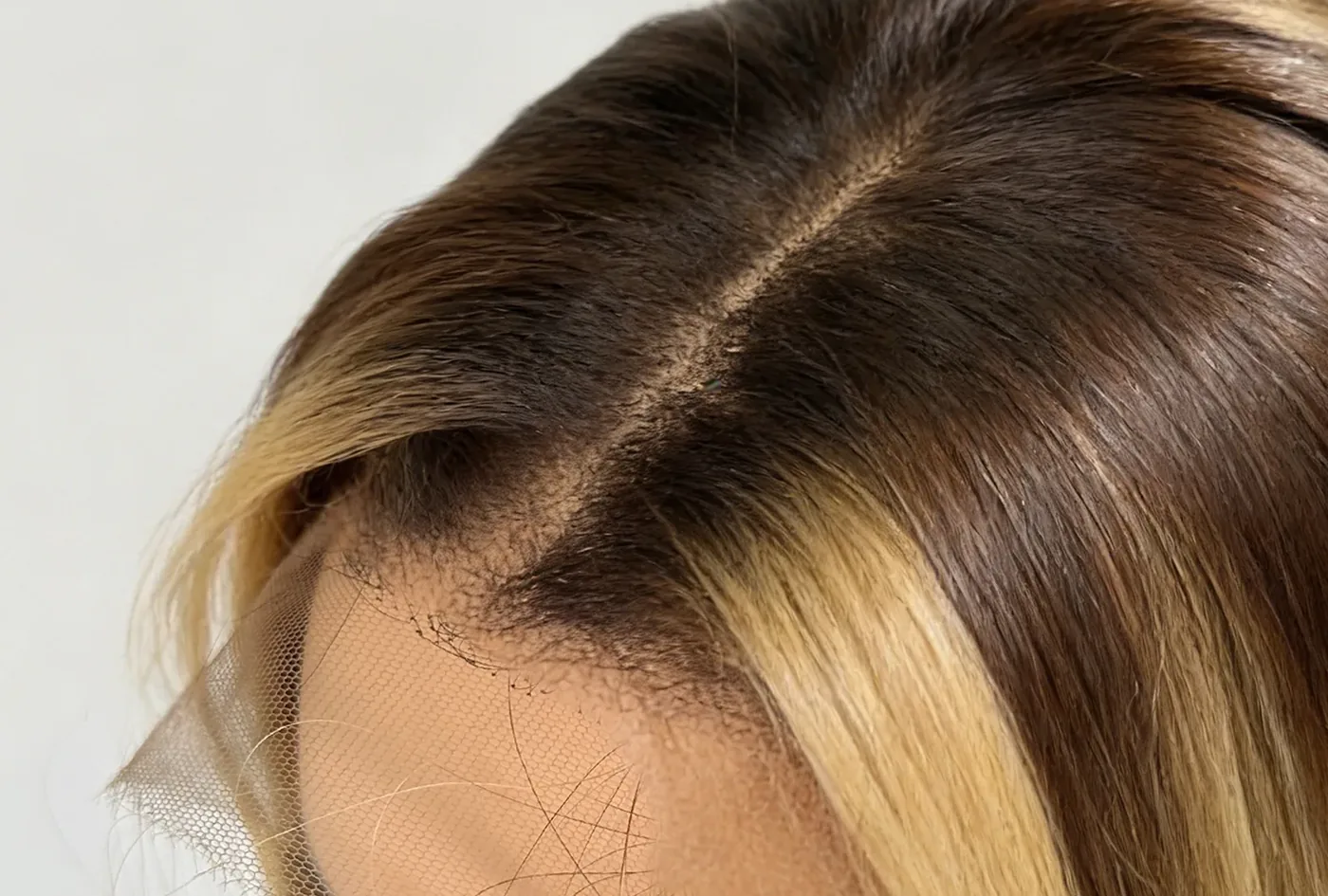 root transition and lace parting checked on a paid balayage wig sample